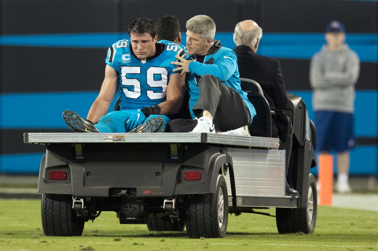 Carolina Panthers linebacker Luke Kuechly (59) is carted from the field after sustaining a shoulder injury and a possible concussion in action against the New Orleans Saints Thursday November 17, 2016 in Charlotte, N.C. (Damian Strohmeyer via AP)