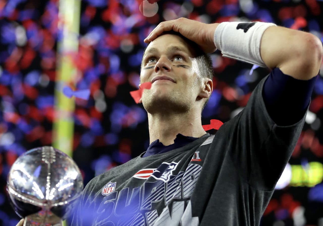 HOUSTON, TX - FEBRUARY 05: Tom Brady #12 of the New England Patriots celebrates after the Patriots celebrates after the Patriots defeat the Atlanta Falcons 34-28 during Super Bowl 51 at NRG Stadium on February 5, 2017 in Houston, Texas. (Photo by Ronald Martinez/Getty Images)