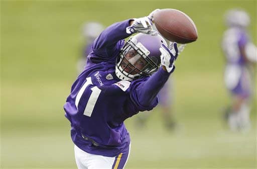 Importado desde Miami, Mike Wallace (AP-NFL).