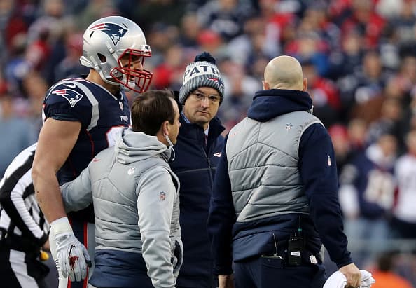 FOXBOROUGH, MA - JANUARY 21: Rob Gronkowski #87 of the New England Patriots walks off the field after an injury in the second quarter during the AFC Championship Game against the Jacksonville Jaguars at Gillette Stadium on January 21, 2018 in Foxborough, Massachusetts. (Photo by Maddie Meyer/Getty Images)