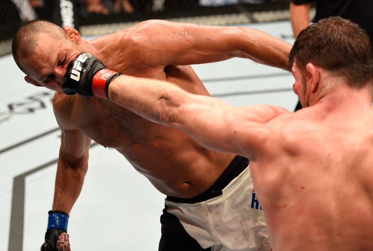 Bisping sacó su casta de campeón tras aguantar los bombazos de su veterano rival, que a sus 46 años, fue digno combatiente en los cinco rounds.