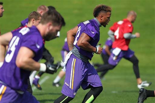 Calentamiento básico en Minnesota (AP-NFL).
