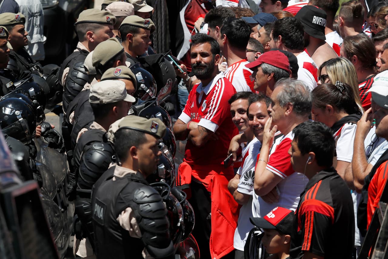 BUENOS AIRES, ARGENTINA - NOVEMBER 25: Riot police stand guard outside of Monumental Stadium of River Plate before the second leg of the final of Copa CONMEBOL Libertadores 2018 between River Plate and Boca Juniors at Estadio Monumental Antonio Vespucio Liberti on November 25, 2018 in Buenos Aires, Argentina. The match was suspended yesterday due to the attacks suffered by players of Boca Juniors on their arrival to the satdium and was rescheduled for today. (Photo by Marcelo Hernandez/Getty Images)