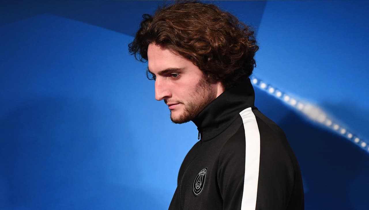 Paris Saint-Germain's French midfielder Adrien Rabiot arrives for a press conference at the Parc des Princes stadium in Paris on October 30, 2017 on the eve of the UEFA Champions League football match against Anderlecht. / AFP PHOTO / FRANCK FIFE (Photo credit should read FRANCK FIFE/AFP/Getty Images)