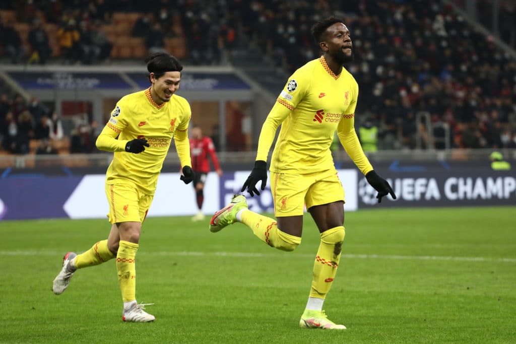 MILAN, ITALY - DECEMBER 07: Divock Origi of Liverpool celebrates after scoring their side's second goal during the UEFA Champions League group B match between AC Milan and Liverpool FC at Giuseppe Meazza Stadium on December 07, 2021 in Milan, Italy. (Photo by Marco Luzzani/Getty Images)
