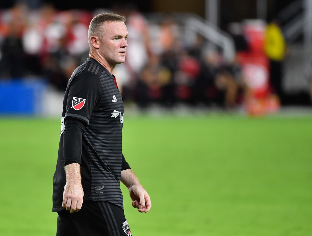 Sep 2, 2018; Washington, DC, USA; D.C. United forward Wayne Rooney (9) on the field against the Atlanta United during the first half at Audi Field. Mandatory Credit: Brad Mills-USA TODAY Sports