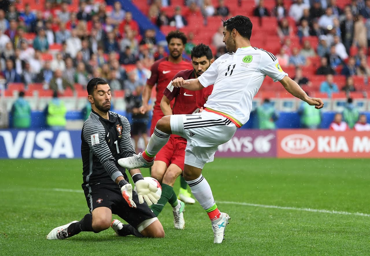 MOSCOW, RUSSIA - JULY 02: Luis Neto of Portugal scores a own goal for Mexico's first goal during the FIFA Confederations Cup Russia 2017 Play-Off for Third Place between Portugal and Mexico at Spartak Stadium on July 2, 2017 in Moscow, Russia. (Photo by Laurence Griffiths/Getty Images)