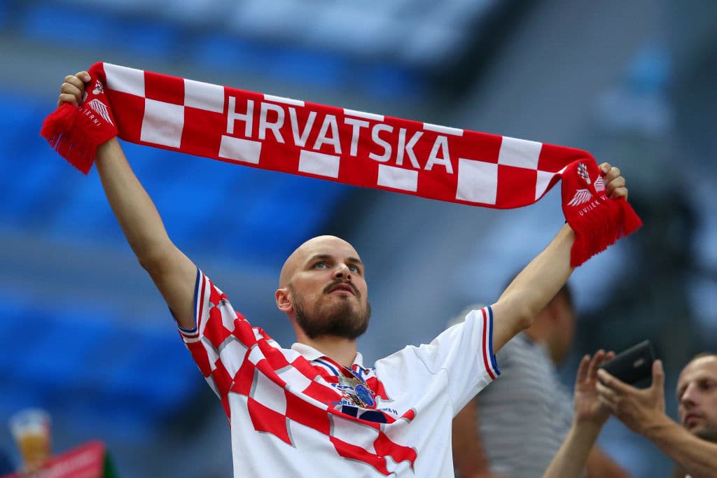 NIZHNY NOVGOROD, RUSSIA - JULY 01: A Croatia fan enjoys the pre match atmosphere prior to the 2018 FIFA World Cup Russia Round of 16 match between 1st Group D and 2nd Group C at Nizhny Novgorod Stadium on July 1, 2018 in Nizhny Novgorod, Russia. (Photo by Alex Livesey/Getty Images)