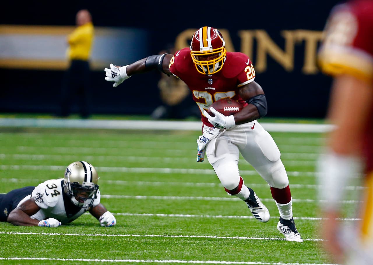 Adrian Peterson se dislocó el hombro en la derrota de los Redskins