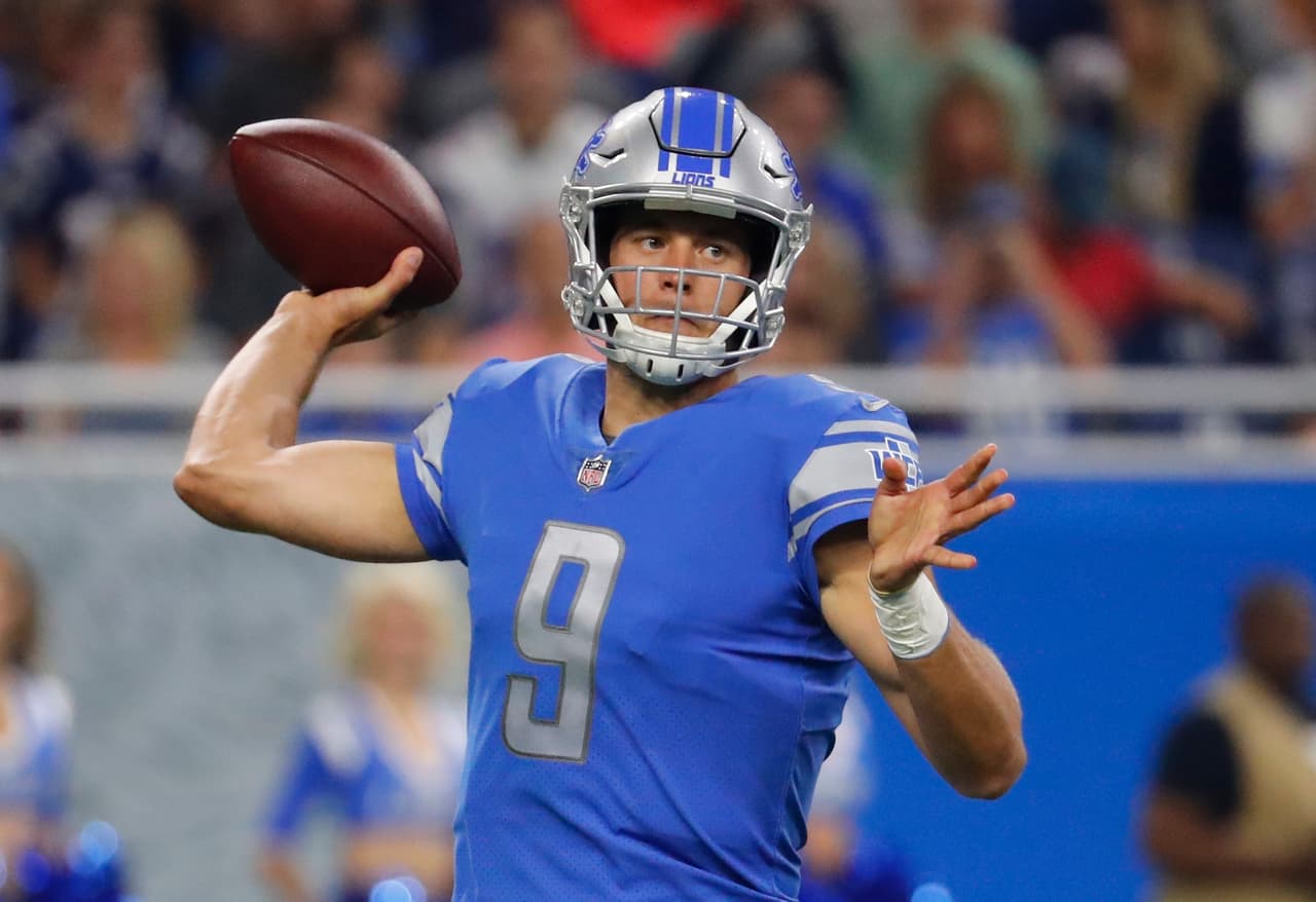 Detroit Lions quarterback Matthew Stafford looks downfield during the first half of an NFL football game against the New England Patriots, Friday, Aug. 25, 2017, in Detroit. (AP Photo/Rick Osentoski)