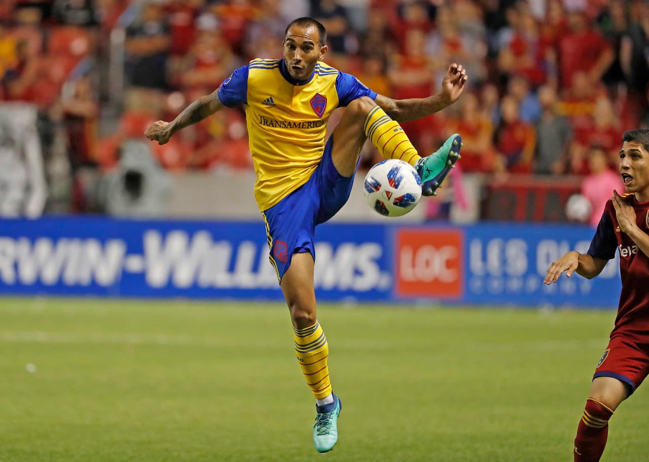 Jul 21, 2018; Sandy, UT, USA; Colorado Rapids defender Edgar Castillo (2) traps the ball in front of Real Salt Lake forward Jefferson Savarino (7) in the second half at Rio Tinto Stadium. Mandatory Credit: Jeff Swinger-USA TODAY Sports