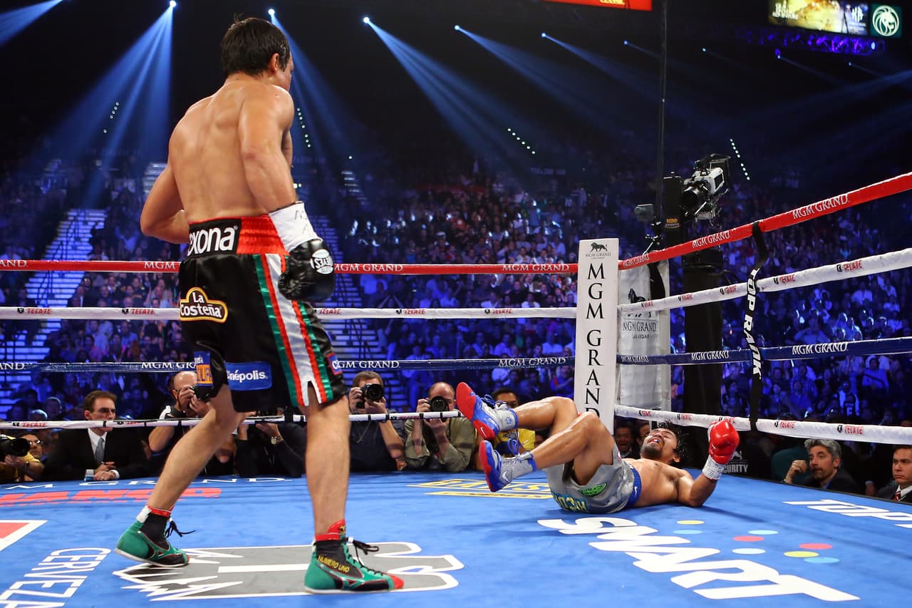Márquez vs Pacquiao IV. Diciembre de 2012. La noche en que Juan Manuel Márquez estableció su supremacía y legado con un demoledor recto de derecha que durmió a Pacquiao en Las Vegas.