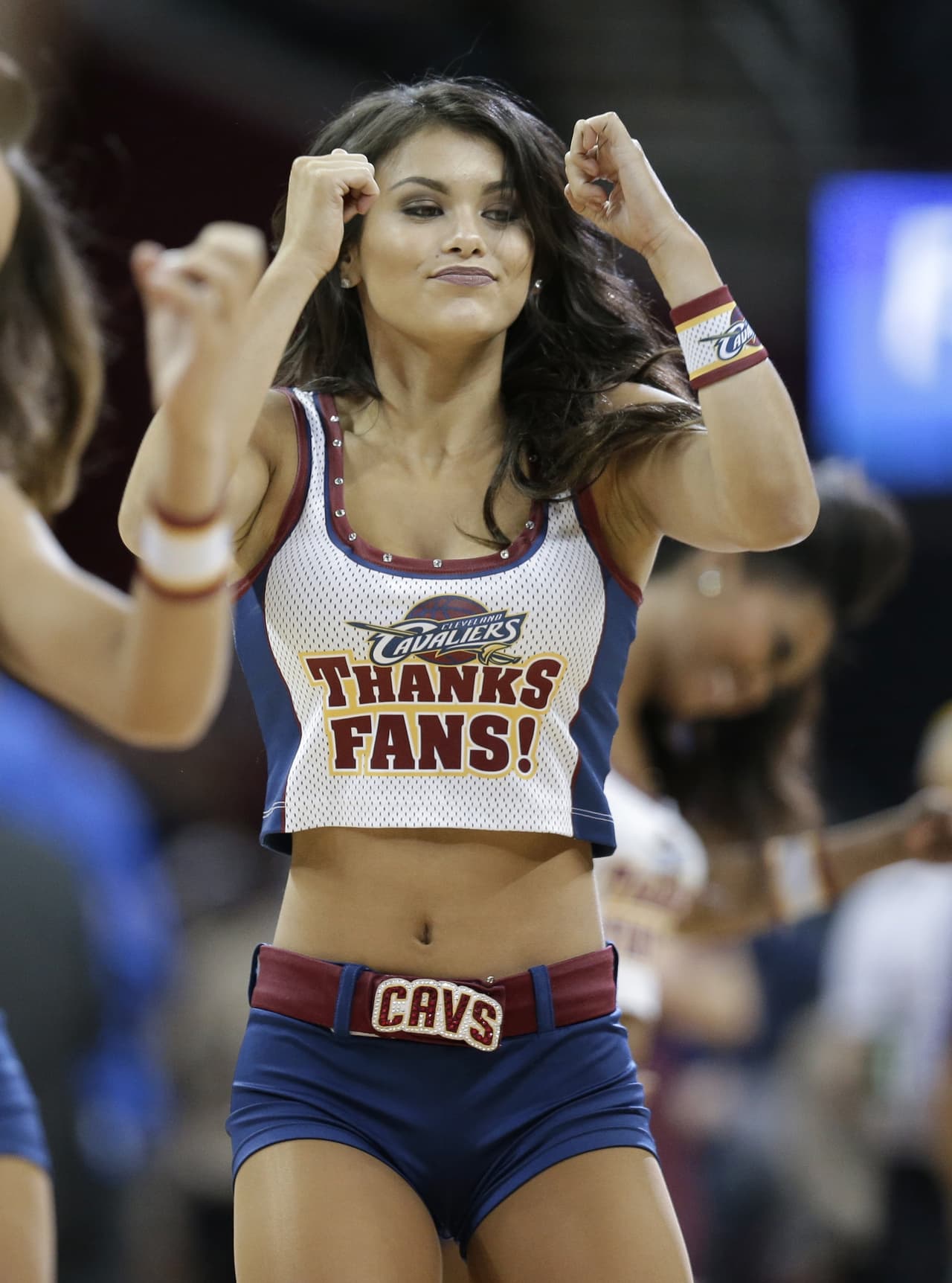 A Cleveland Cavaliers cheerleader performs in the first half of an NBA basketball game between the Detroit Pistons and the Cleveland Cavaliers, Wednesday, April 13, 2016, in Cleveland. (AP Photo/Tony Dejak)