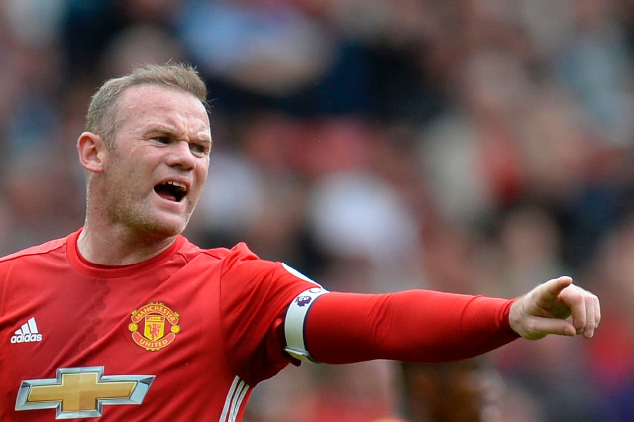 Manchester United's English striker Wayne Rooney shouts instructions during the English Premier League football match between Manchester United and Cyrstal Palace at Old Trafford in Manchester, north west England, on May 21, 2017. / AFP PHOTO / Oli SCARFF / RESTRICTED TO EDITORIAL USE. No use with unauthorized audio, video, data, fixture lists, club/league logos or 'live' services. Online in-match use limited to 75 images, no video emulation. No use in betting, games or single club/league/player publications. / (Photo credit should read OLI SCARFF/AFP/Getty Images)