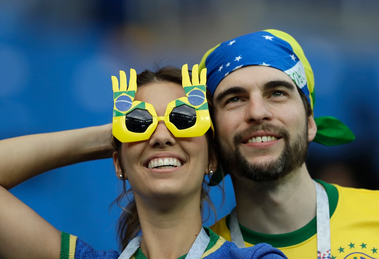Brazil soccer fans smile ahead the group E match between Brazil and Switzerland at the 2018 soccer World Cup in the Rostov Arena in Rostov-on-Don, Russia, Sunday, June 17, 2018. (AP Photo/Themba Hadebe)