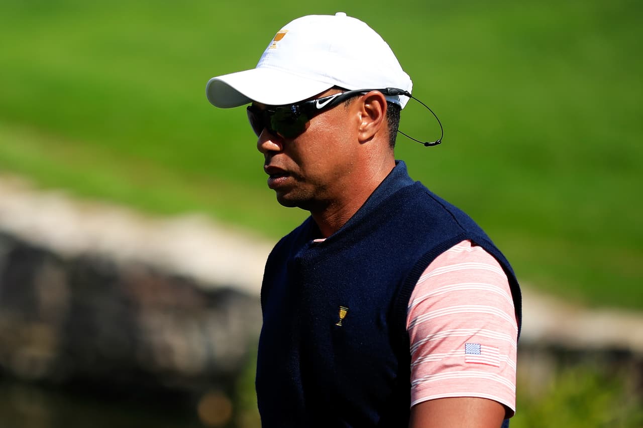 JERSEY CITY, NJ - SEPTEMBER 29: Captain's assistant Tiger Woods of the U.S. Team walks during Friday four-ball matches of the Presidents Cup at Liberty National Golf Club on September 29, 2017 in Jersey City, New Jersey. (Photo by Cliff Hawkins/Getty Images)