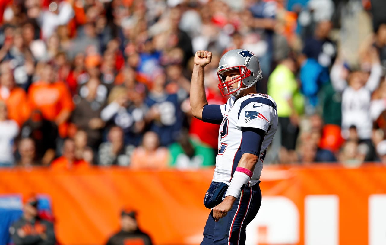 New England Patriots quarterback Tom Brady (12) celebrates after leading his team to a touchdown during an NFL football game against the Cleveland Browns on Sunday, Oct. 9, 2016 in Cleveland. New England won 33-13. (Aaron M. Sprecher via AP)