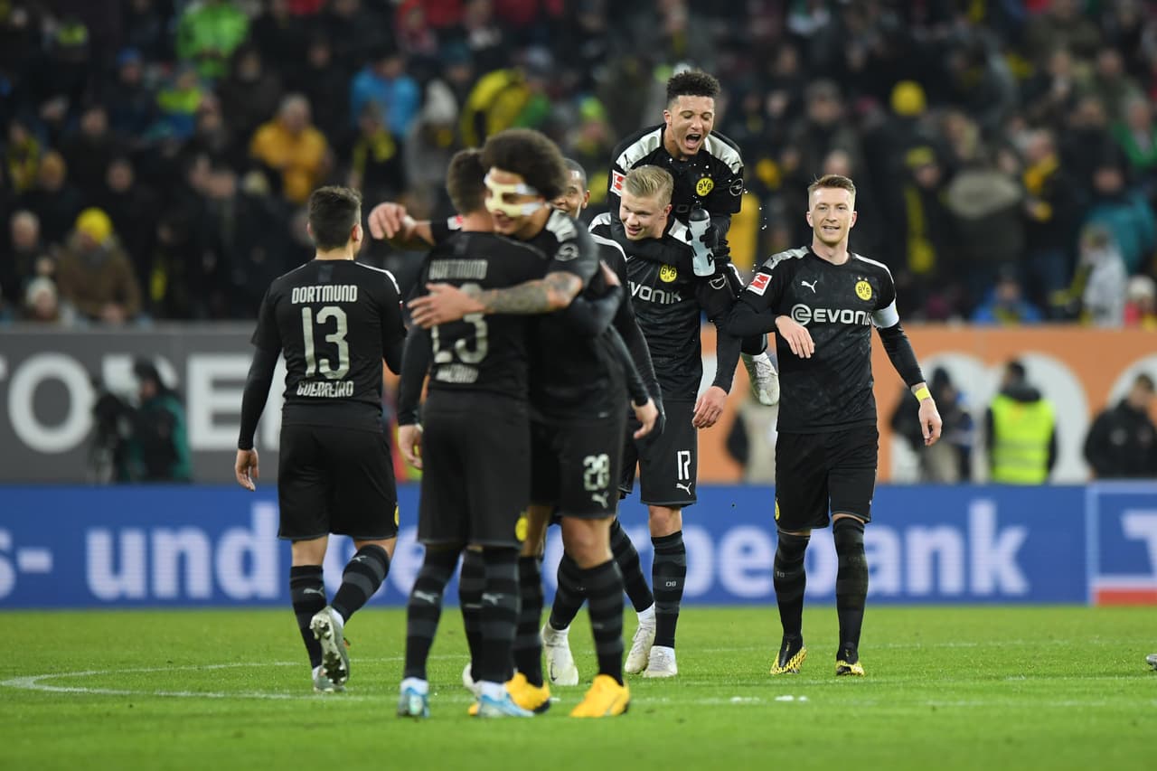 Niederlechner (34’, 55’) y Ritcher (46’) anotaron los goles de Augsburgo. Por Dortmund marcaron Brandt (49’), Braut Haland (59’, 70’, 79’) y Sancho (61’).
