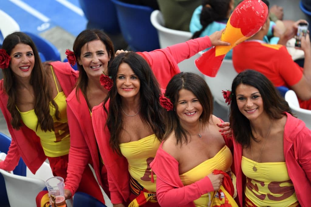 Spain's fans pose before the Russia 2018 World Cup Group B football match between Spain and Morocco at the Kaliningrad Stadium in Kaliningrad on June 25, 2018. (Photo by OZAN KOSE / AFP) / RESTRICTED TO EDITORIAL USE - NO MOBILE PUSH ALERTS/DOWNLOADS (Photo credit should read OZAN KOSE/AFP/Getty Images)