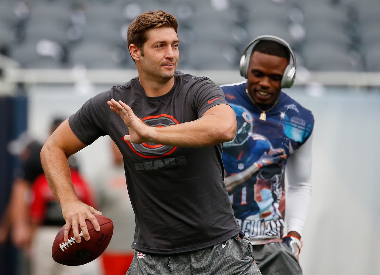 Chicago Bears quarterback Jay Cutler, left, and wide receiver Josh Bellamy smile as they warm up before an NFL football game against the Philadelphia Eagles, Monday, Sept. 19, 2016, in Chicago. (AP Photo/Nam Y. Huh)