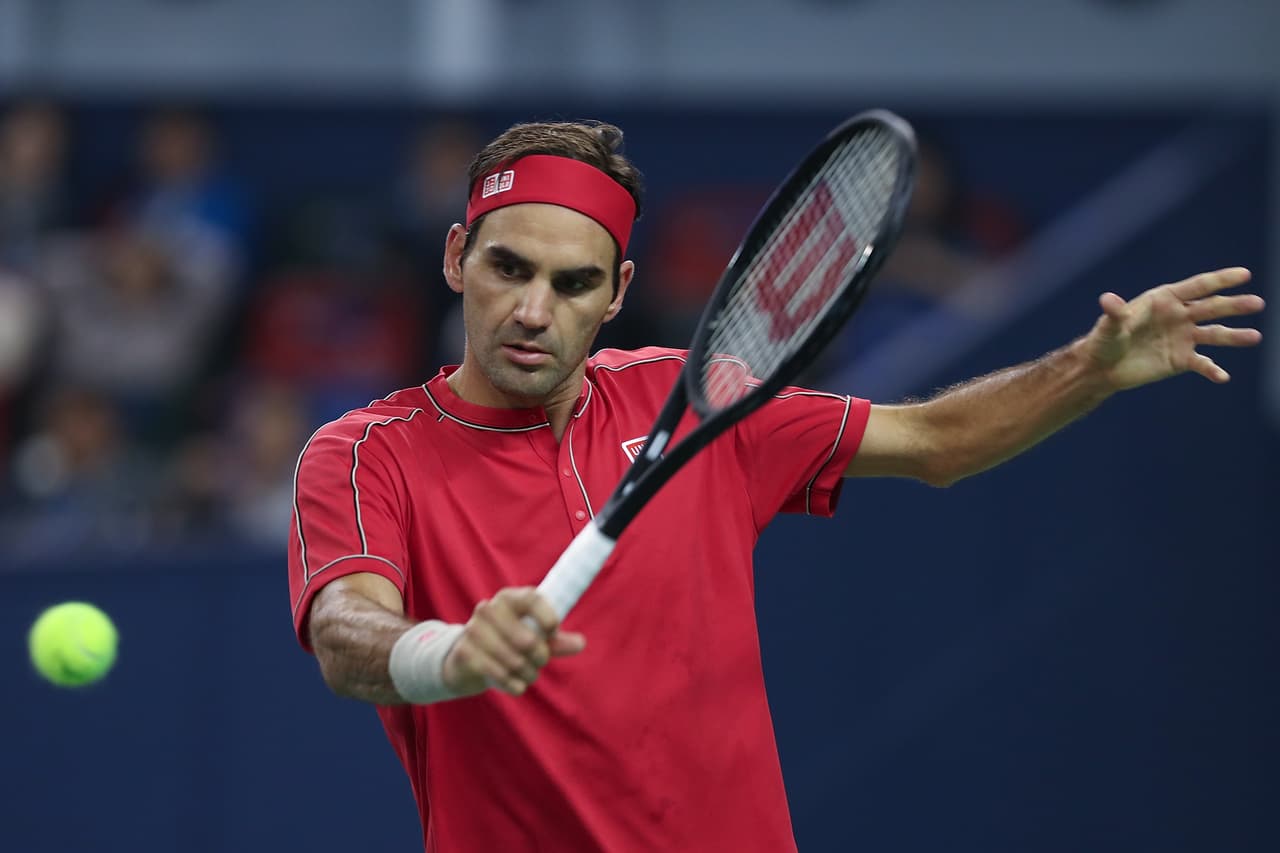 SHANGHAI, CHINA - OCTOBER 11: Roger Federer of Switzerland in action against Alexander Zverev of Germany during the Men's singles Quarterfinals match of 2019 Rolex Shanghai Masters day seven at Qi Zhong Tennis Centre (Photo by Lintao Zhang/Getty Images)