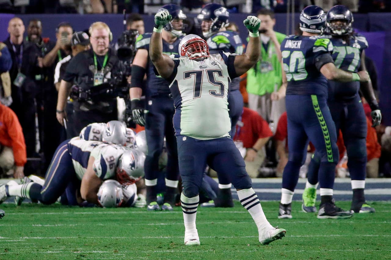 FILE - In this Feb. 1, 2015, file photo, New England Patriots defensive tackle Vince Wilfork (75) celebrates after Malcolm Butler intercepted Seattle Seahawks quarterback Russell Wilson during the second half of NFL Super Bowl XLIX football game in Glendale, Ariz. Wilfork played 158 games over 11 seasons for the New England Patriots before joining the Texans this season. As the defensive tackle prepares to face his former team for the first time he reflects on his successful time there and his feelings on parting with the organization. (AP Photo/Elise Amendola, File)