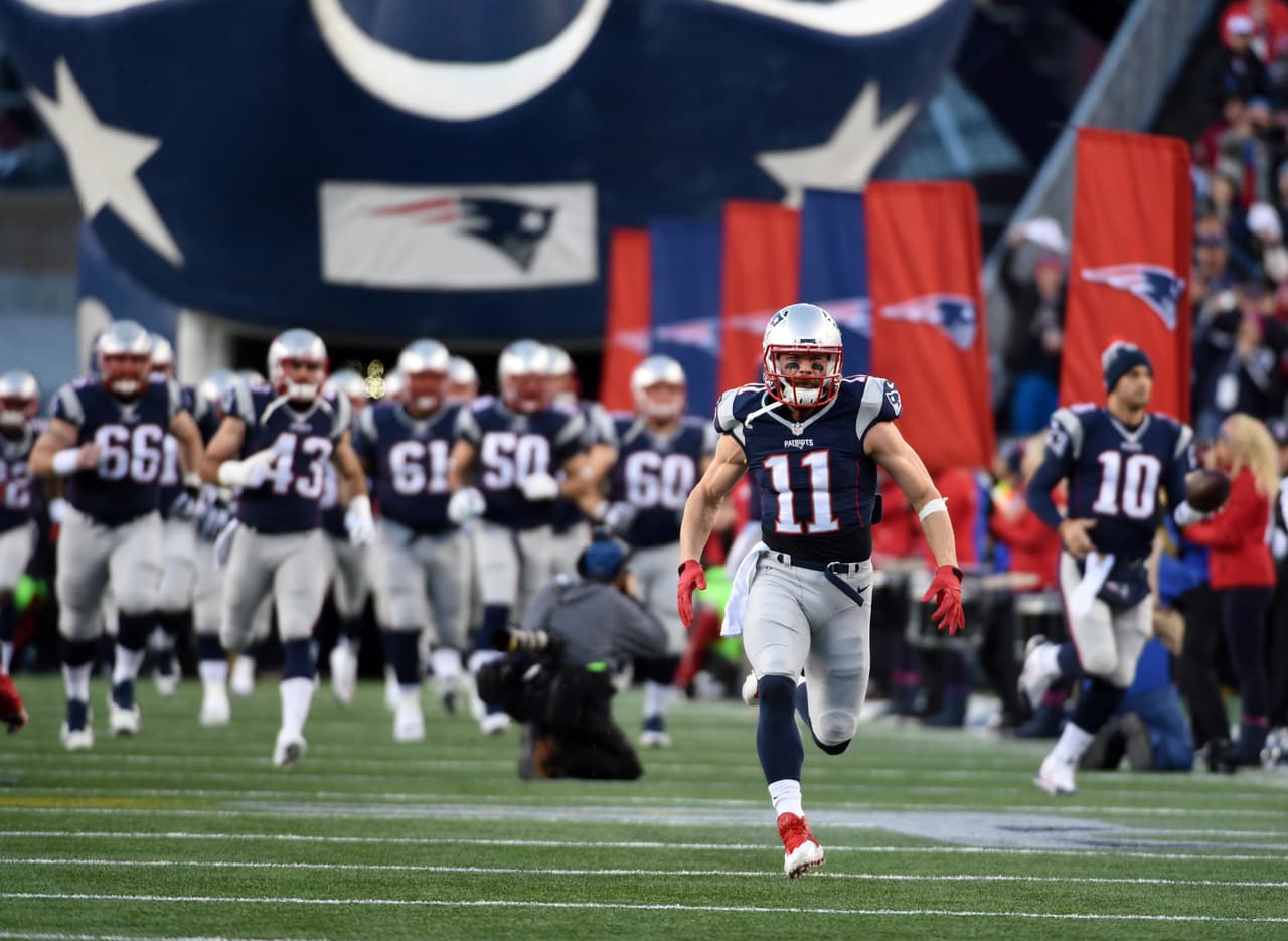New England Patriots wide receiver Julian Edelman (11) runs onto the field before an NFL divisional playoff football game against the Kansas City Chiefs, Saturday, Jan. 16, 2016, in Foxborough, Mass. The Patriots defeated the Chiefs 27-10. (Kirby Lee/NFL)
