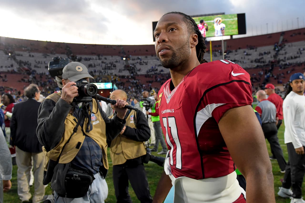 Arizona Cardinals wide receiver Larry Fitzgerald walks off the field after their 44-6 win against the Los Angeles Rams during an NFL football game Sunday, Jan. 1, 2017, in Los Angeles. (AP Photo/Mark J. Terrill)
