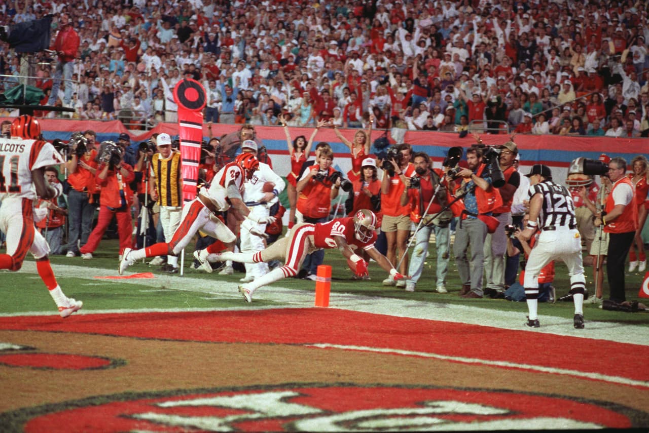 Super Bowl XXII (Cincinnati Bengals 16-20 San Francisco Giants) | La sede fue el Joe Robbie Stadium en Miami. MVP: Jerry Rice (WR San Francisco). Costo comercial de 30 segundos: 675 mil dólares.