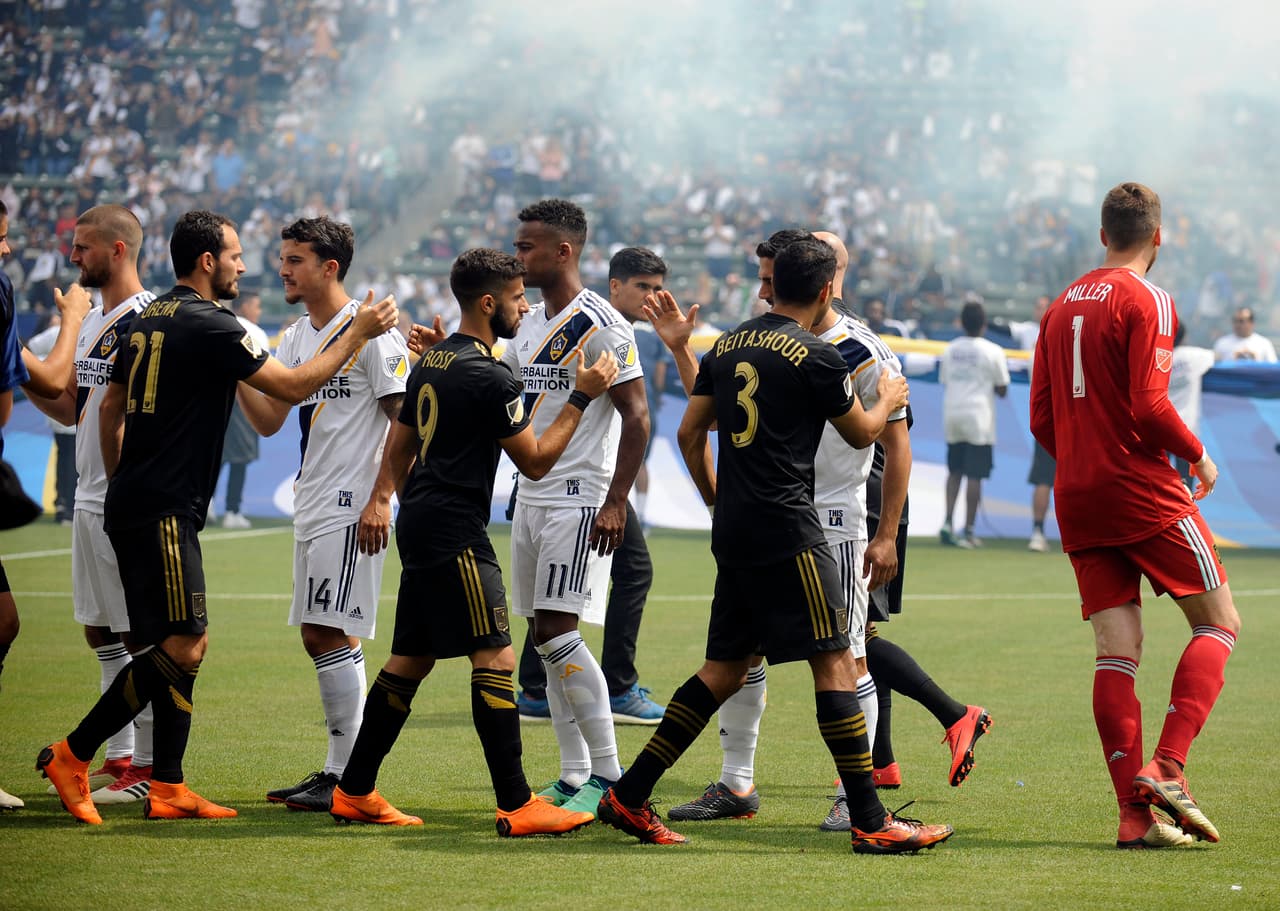 March 31, 2018; Carson, CA, USA; Los Angeles FC and Los Angeles Galaxy starters greet one another before the game at StubHub Center. Mandatory Credit: Gary A. Vasquez-USA TODAY Sports