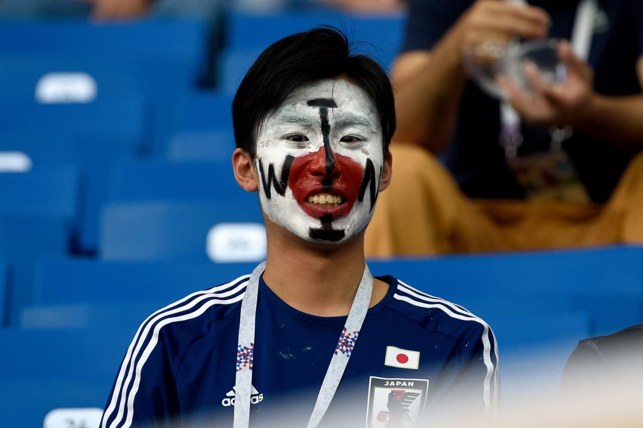 A Japan supporter waits for the start of the Russia 2018 World Cup round of 16 football match between Belgium and Japan at the Rostov Arena in Rostov-On-Don on July 2, 2018. (Photo by JUAN BARRETO / AFP) / RESTRICTED TO EDITORIAL USE - NO MOBILE PUSH ALERTS/DOWNLOADS (Photo credit should read JUAN BARRETO/AFP/Getty Images)