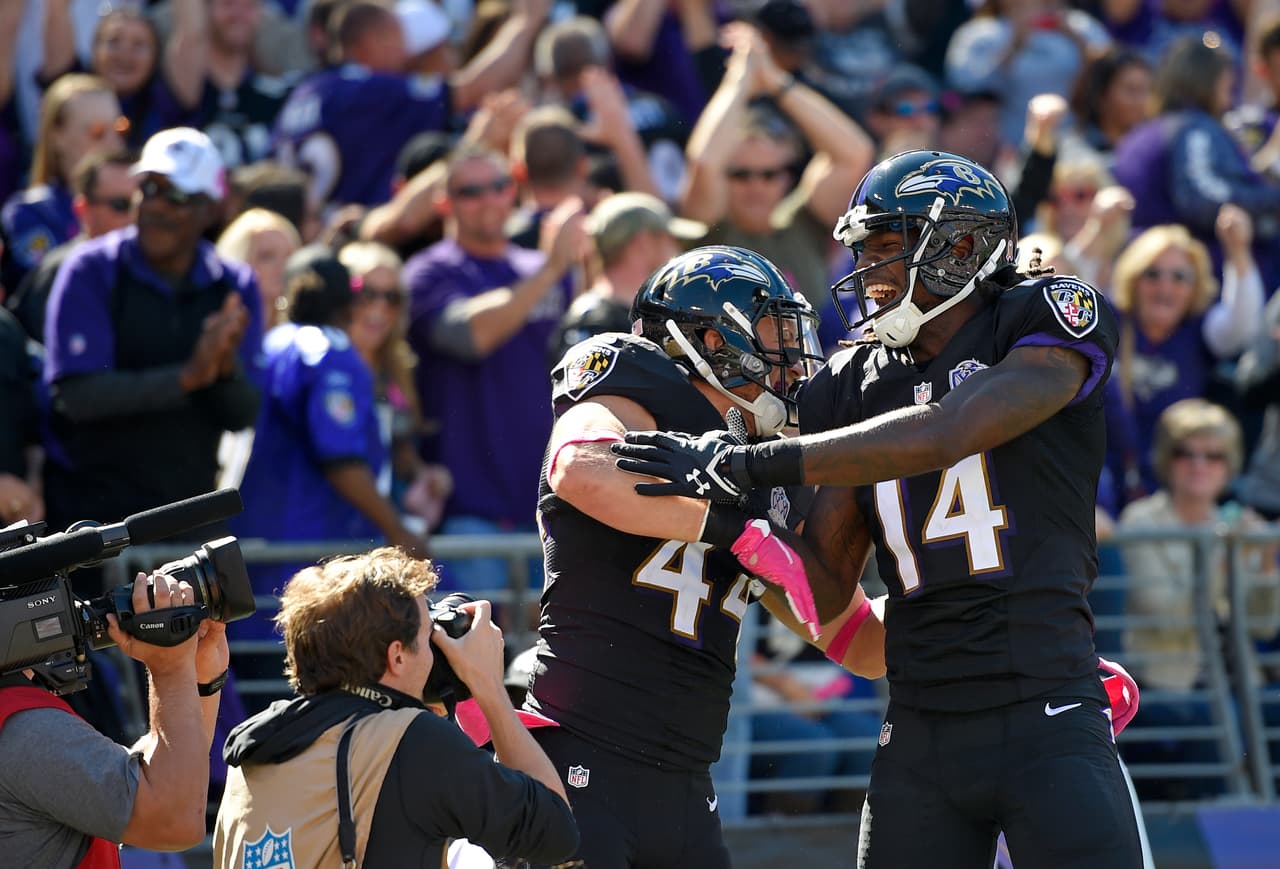 Marlon Brown #14 se queda en Baltimore para la temporada 2016.