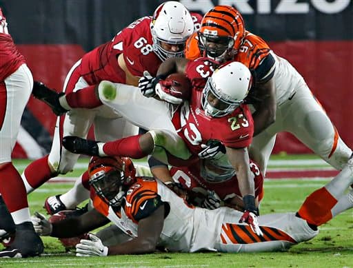 Los Cardinals salieron avantes en Domingo por la Noche al batir en el último momento a los Bengals 34-31. Acá las mejores tomas del partido.