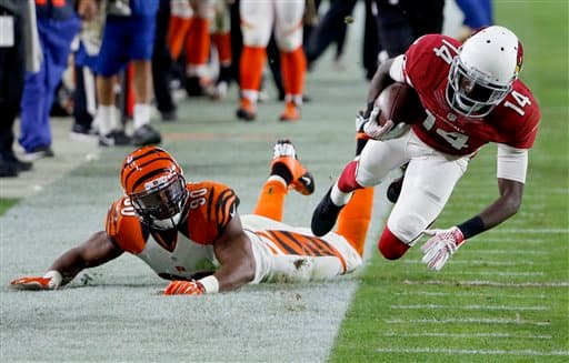Los Cardinals salieron avantes en Domingo por la Noche al batir en el último momento a los Bengals 34-31. Acá las mejores tomas del partido.