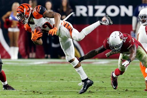 Los Cardinals salieron avantes en Domingo por la Noche al batir en el último momento a los Bengals 34-31. Acá las mejores tomas del partido.