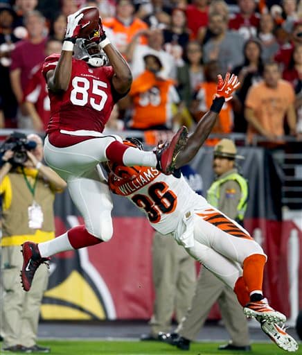 Los Cardinals salieron avantes en Domingo por la Noche al batir en el último momento a los Bengals 34-31. Acá las mejores tomas del partido.