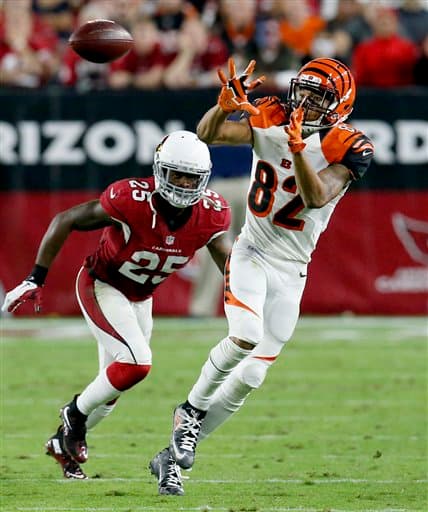 Los Cardinals salieron avantes en Domingo por la Noche al batir en el último momento a los Bengals 34-31. Acá las mejores tomas del partido.