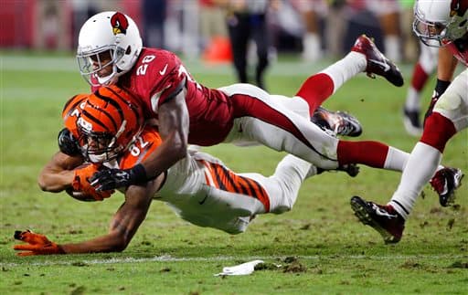 Los Cardinals salieron avantes en Domingo por la Noche al batir en el último momento a los Bengals 34-31. Acá las mejores tomas del partido.