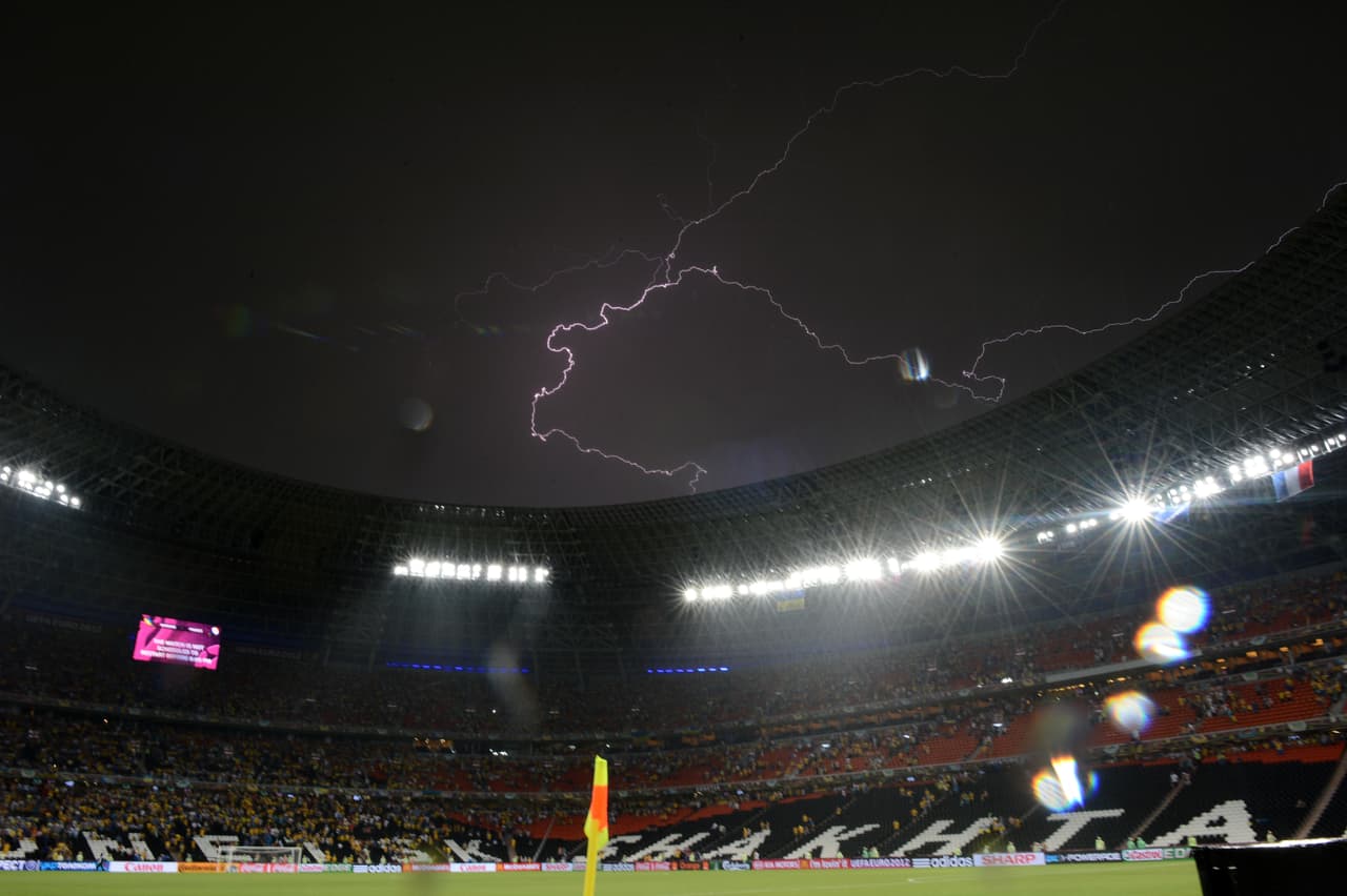 A lighting is pictured as the Euro 2012 championships football match Ukraine vs France is suspended due to heavy rainfall on June 15, 2012 at the Donbass Arena in Donetsk. AFP PHOTO/ FRANCK FIFE (Photo credit should read FRANCK FIFE/AFP/GettyImages)