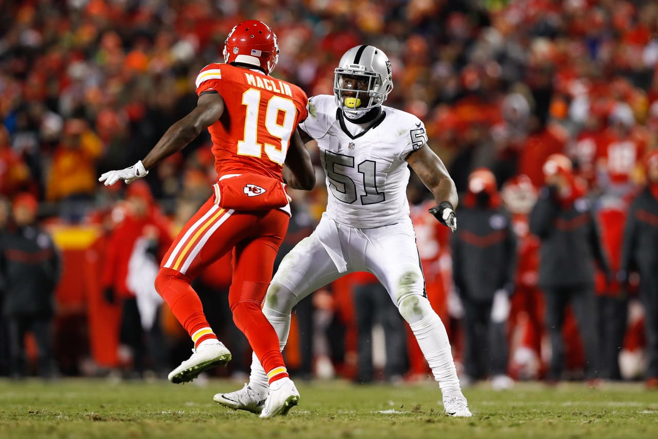 Oakland Raiders outside linebacker Bruce Irvin (51) covers Kansas City Chiefs wide receiver Jeremy Maclin (19) during an NFL football game on Thursday, Dec. 8, 2016 in Kansas City, Mo. Kansas City 21-13. (Aaron M. Sprecher via AP)