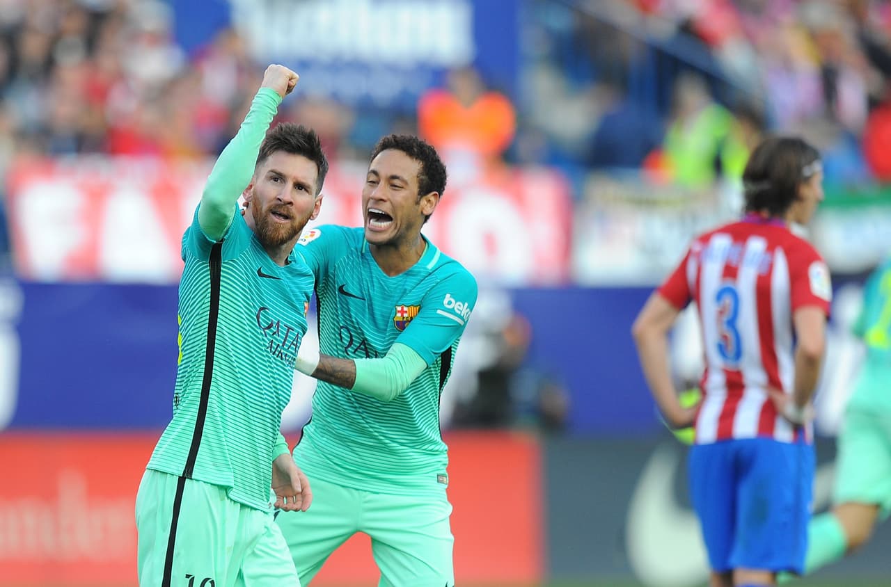 MADRID, SPAIN - FEBRUARY 26: Lionel Messi of FC Barcelona celebrates with Neymar after scoring his 2nd goal during the La Liga match between Club Atletico de Madrid and FC Barcelona at Vicente Calderon Stadium on February 26, 2017 in Madrid, Spain. (Photo by Denis Doyle/Getty Images)
