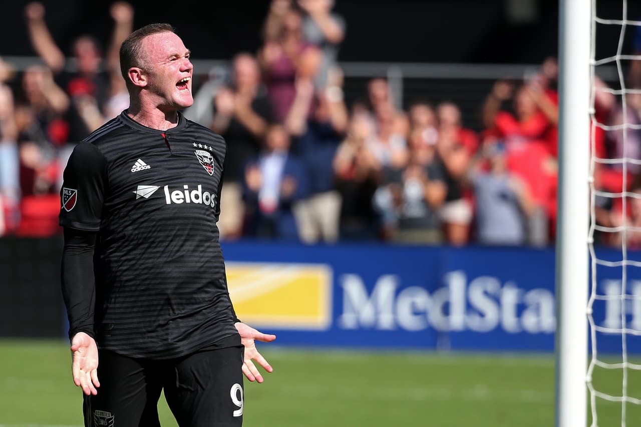 Oct 7, 2018; Washington, DC, USA; D.C. United forward Wayne Rooney (9) celebrates after scoring the go-ahead goal on a penalty kick against Chicago Fire in the second half at Audi Field. United won 2-1. Mandatory Credit: Geoff Burke-USA TODAY Sports