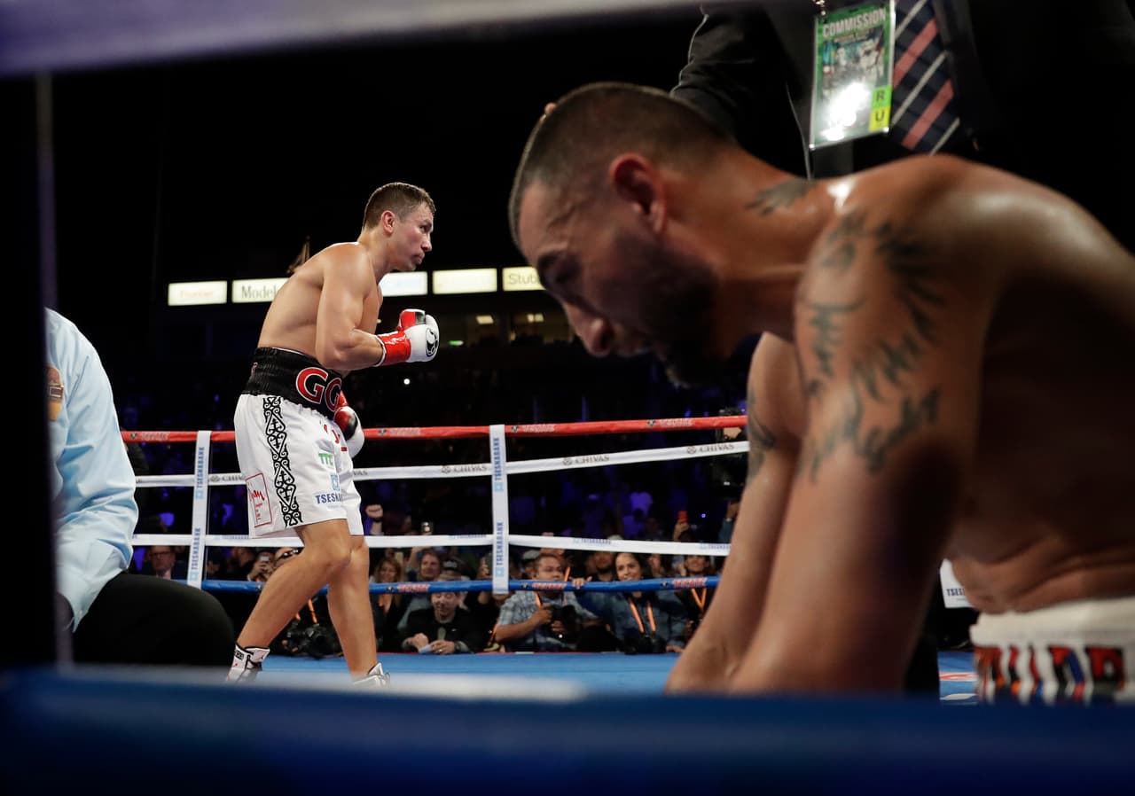 Gennady Golovkin celebrates after knocking down Vanes Martirosyan in their middleweight title boxing match Saturday, May 5, 2018, in Carson, Calif. Golovkin won the bout. (AP Photo/Chris Carlson)