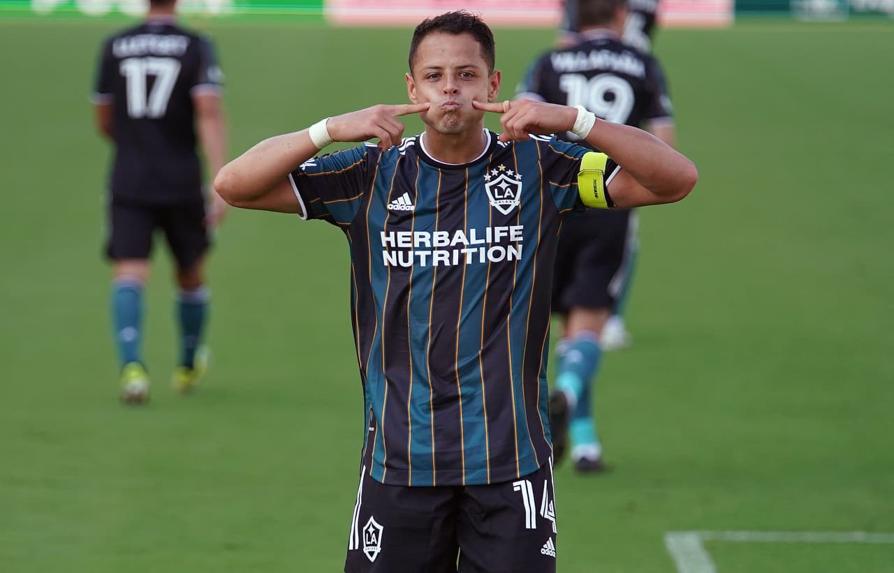 Apr 18, 2021; Fort Lauderdale, FL, Fort Lauderdale, FL, USA; Los Angeles Galaxy forward Javier Hernandez (14) gesture in the direction of fans after his goal against Inter Miami CF during the second half at DRV PNK Stadium. Mandatory Credit: Jasen Vinlove-USA TODAY Sports