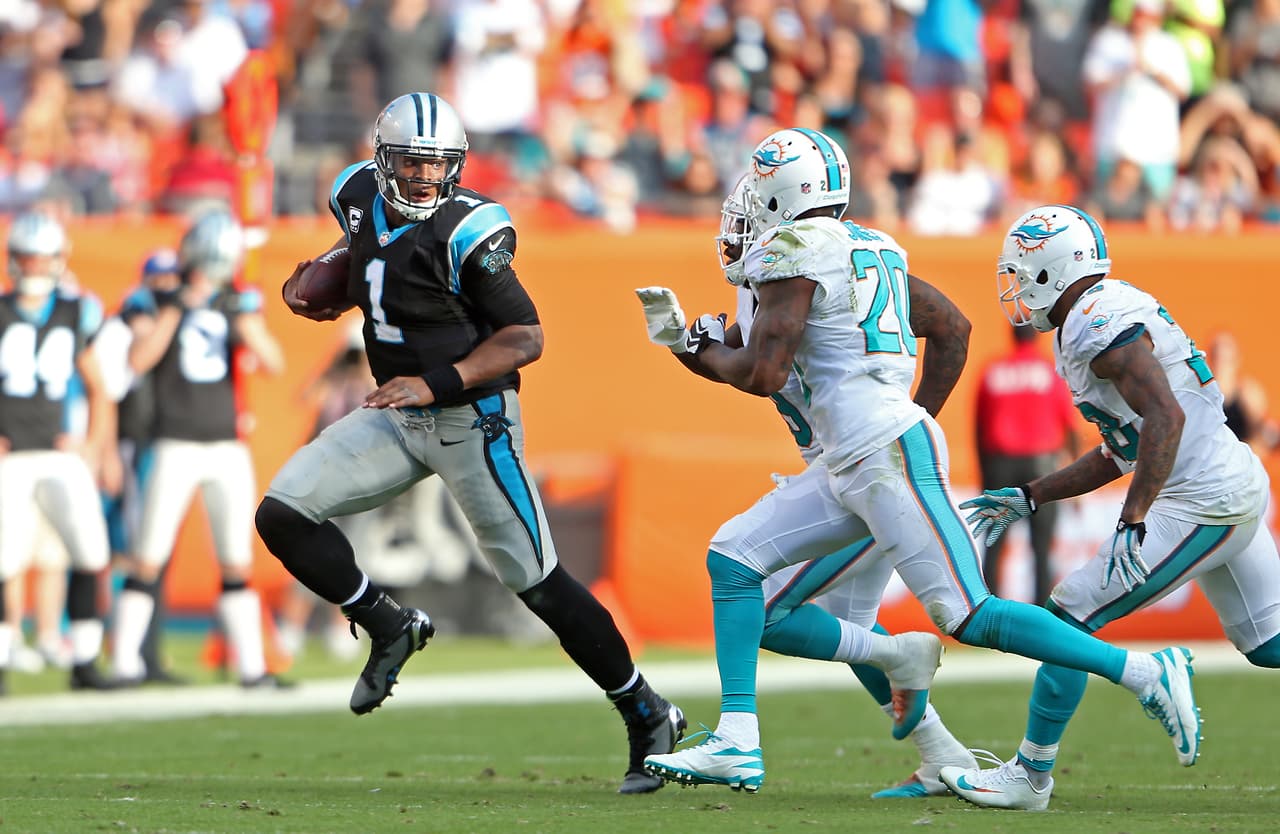 Carolina Panthers Cam Newton (1) during a game against the Miami Dolphins at Sun Life Stadium in Miami on November 24, 2013. (Photo/Tom DiPace)