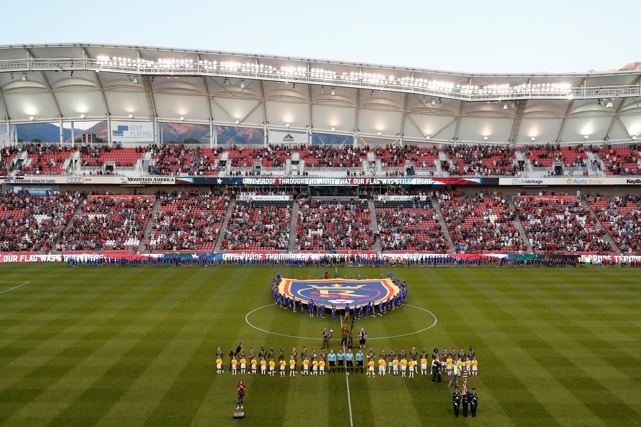 Aug 24, 2019; Sandy, UT, USA; The Real Salt Lake and the Colorado Rapids line up for the national anthem prior to their game at Rio Tinto Stadium. Mandatory Credit: Jeff Swinger-USA TODAY Sports