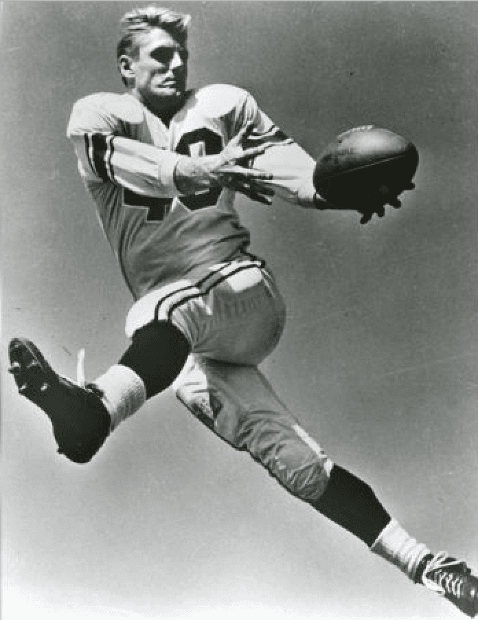 El receptor Elroy Hirsch de Los Angeles Rams en el aire. Año 1951.