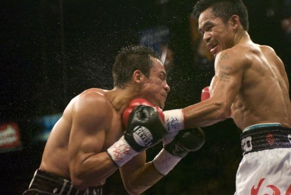 La revancha fue en marzo del 2008 por el título súper pluma CMB que tenía Juan Manuel Márquez. Esta vez Pacquiao ganó por decisión dividida en otra batalla memorable. Juan Manuel Márquez se sintió ganador y pidió una tercera pelea.
