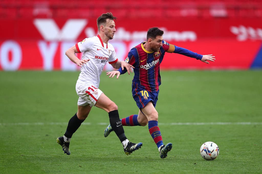 Iván Rakitic y Lionel Messi.