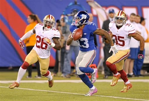 Gran duelo de Domingo por la Noche entre los San Francisco 49ers y los New York Giants. Checa las mejores tomas del triunfo de los Giants.